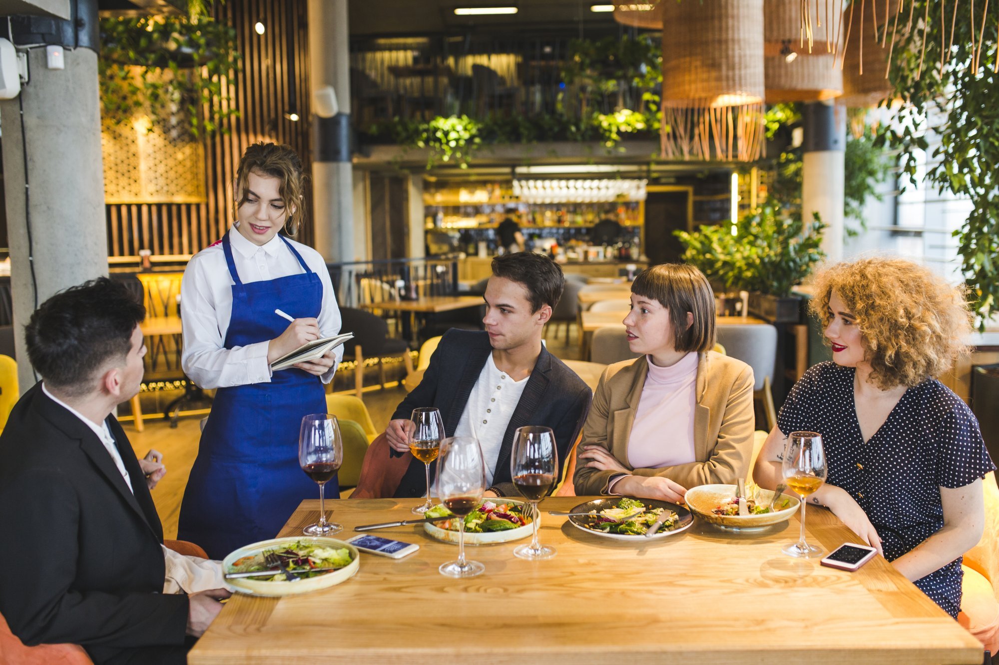 group-friends-eating-restaurant.jpg